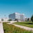 white concrete building near green grass field during daytime
